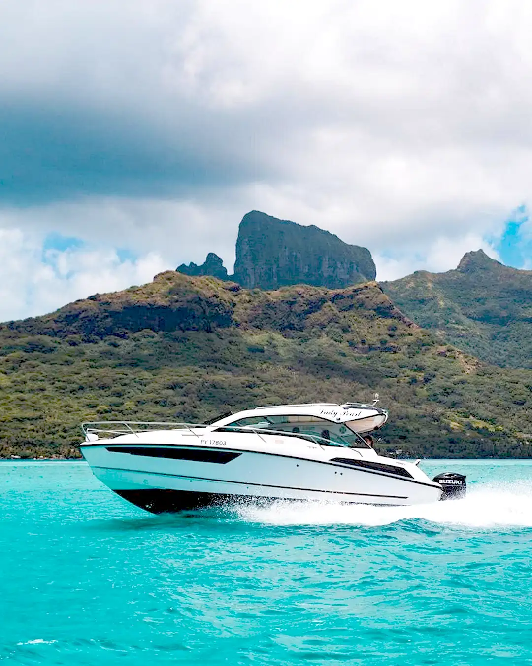 Bora Bora airport boat transfer passing in front of Mount Otemanu