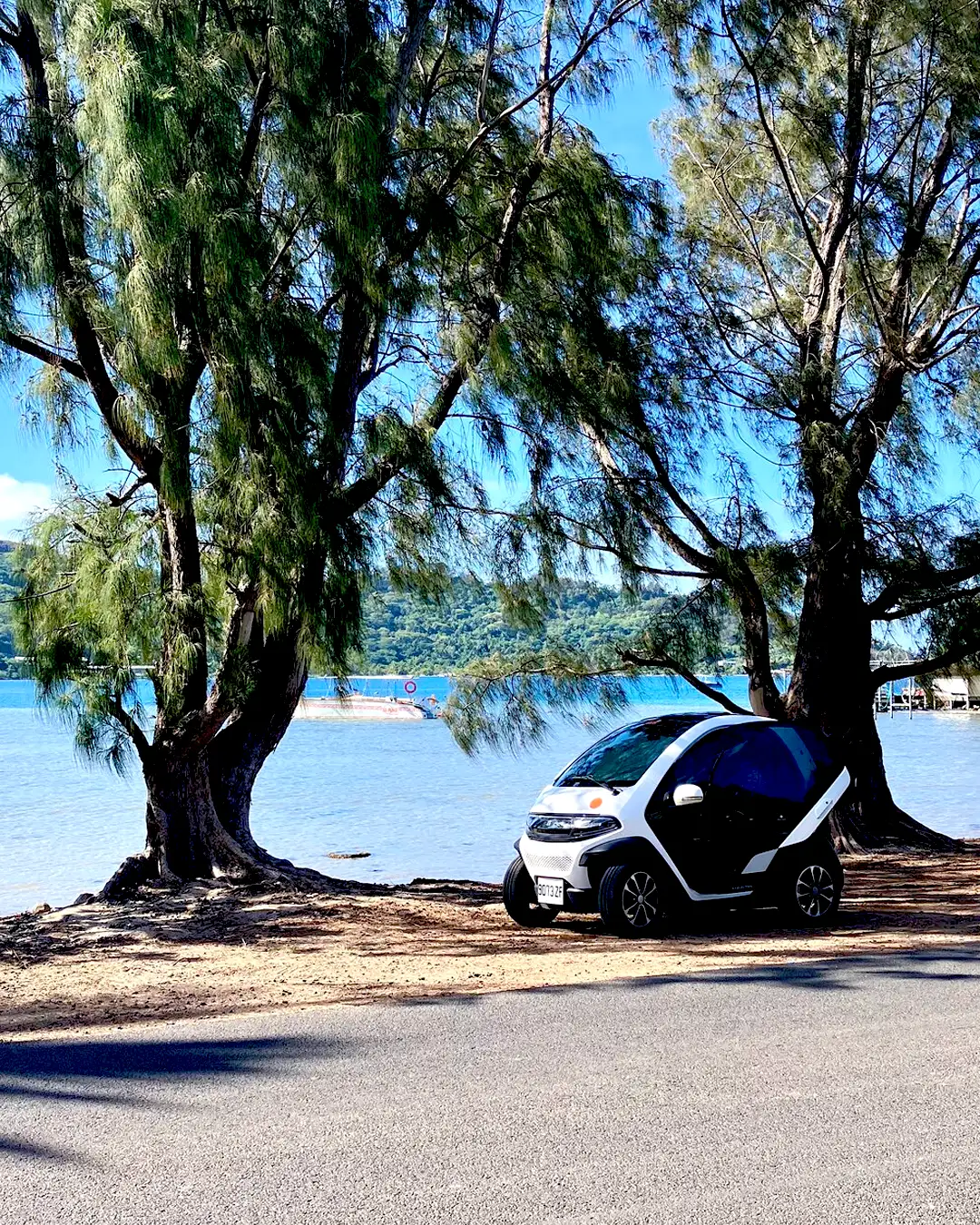 Electric car parked on the side of the road in Bora Bora